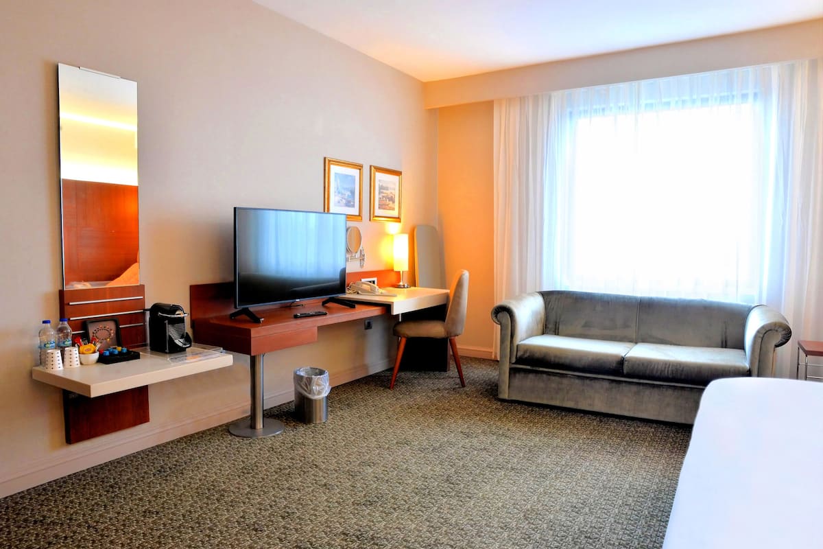 Junior Suite, Smoking | Premium bedding, down comforters, minibar, in-room safe