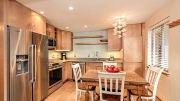 Deluxe Room, Multiple Beds | Private kitchen | Fridge, microwave, coffee/tea maker, cookware/dishes/utensils