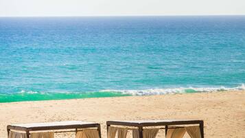 Private beach, sun loungers, beach massages
