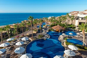 6 outdoor pools, pool umbrellas, sun loungers