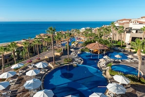 6 outdoor pools, pool umbrellas, sun loungers