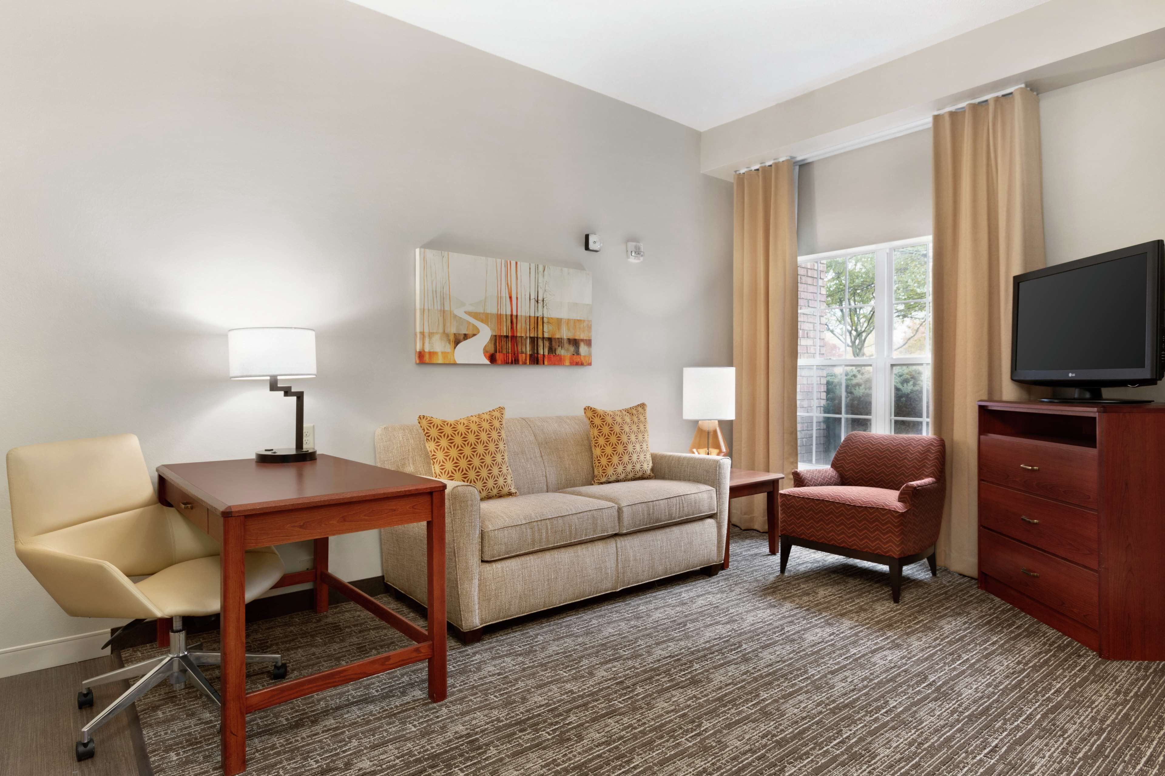 1 queen, hearing accessible, suite, non-smoking | in-room safe, desk, laptop workspace, blackout curtains