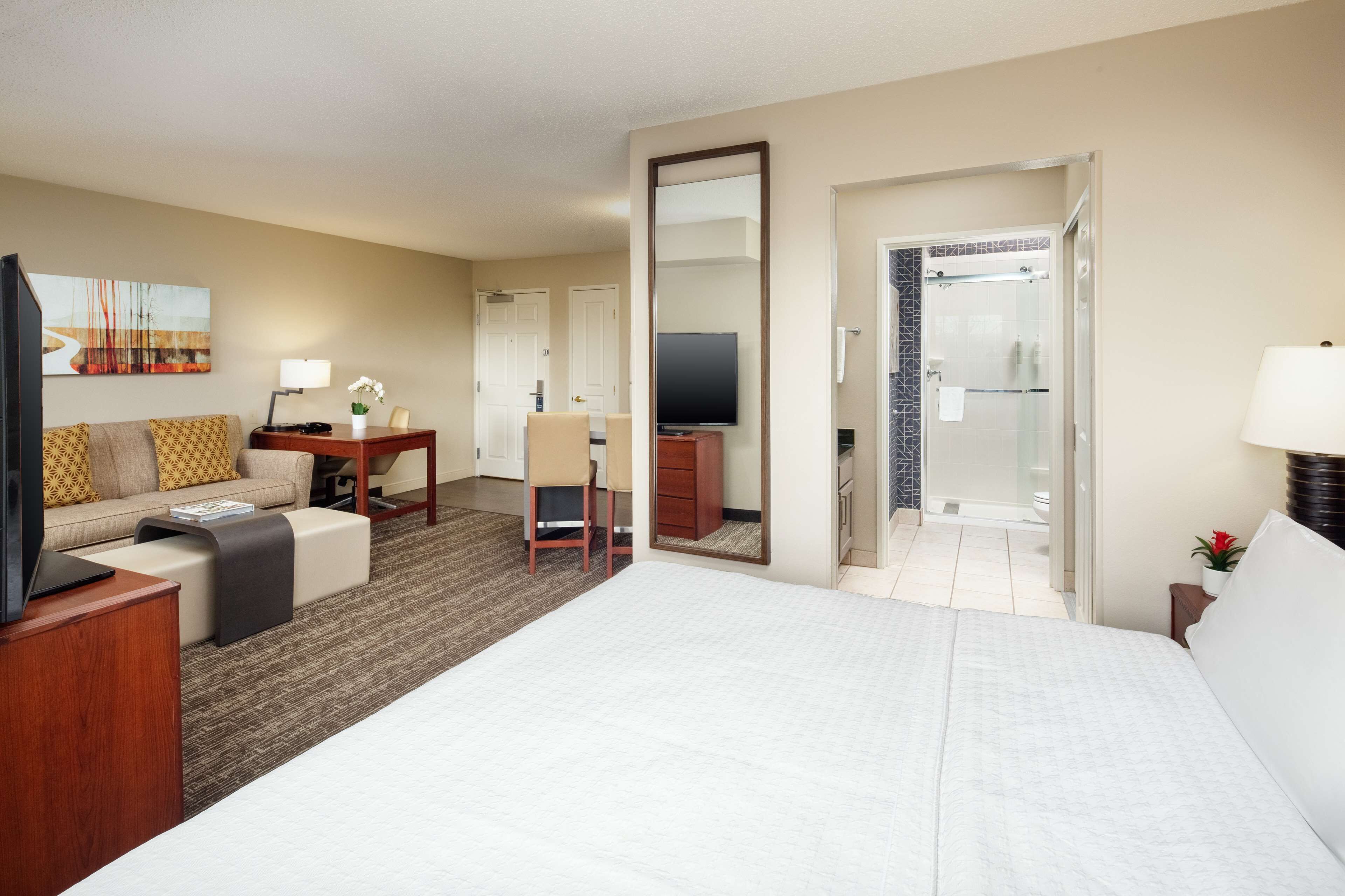 1 King Bed Studio Suite, Non-smoking | Living area | 42-inch flat-screen TV with cable channels, TV