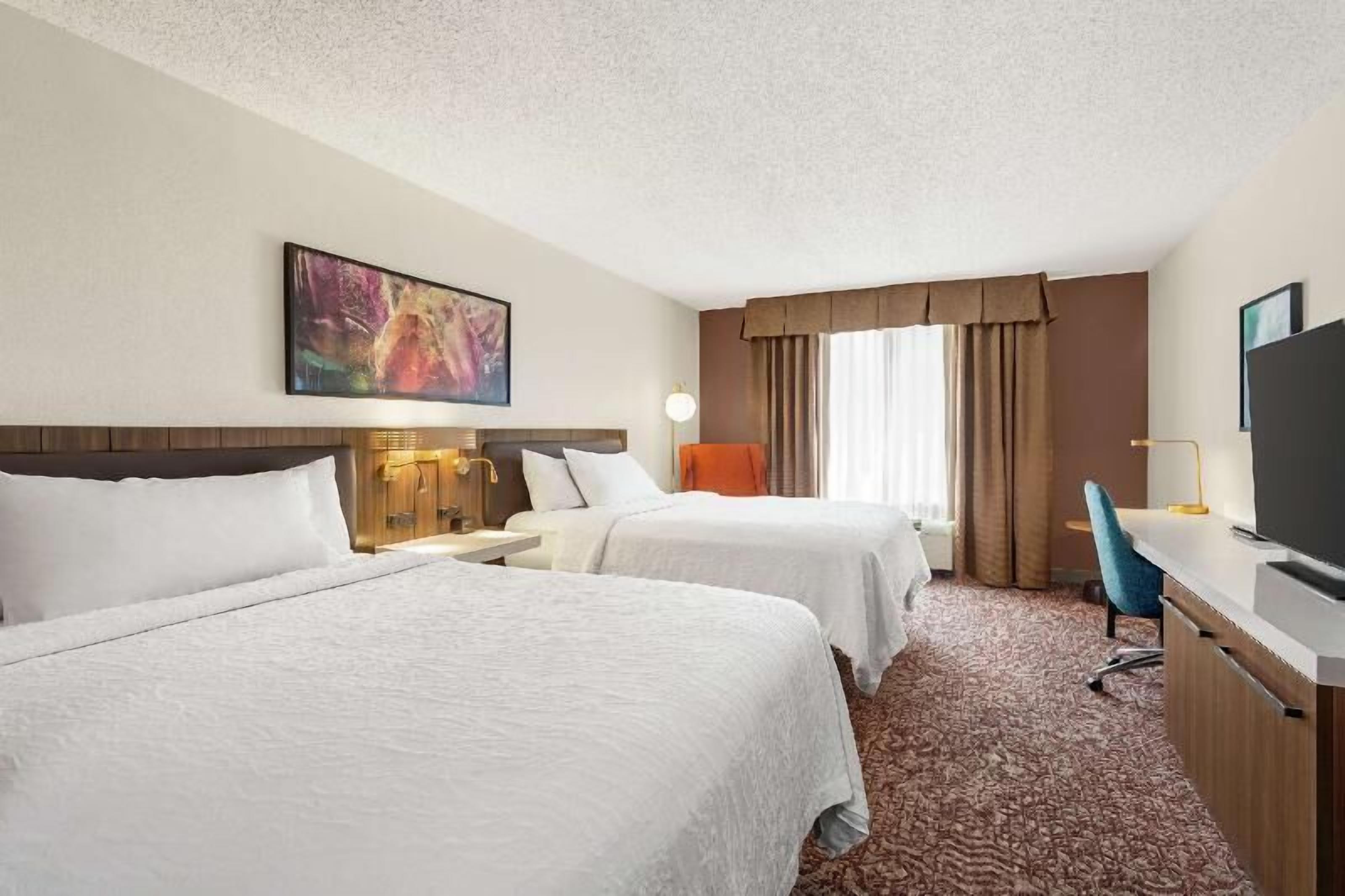 Hypo-allergenic bedding, in-room safe, desk, laptop workspace