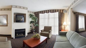 Suite, 1 King-Bett und Schlafsofa, Kamin (Wet Bar) | Wohnzimmer