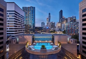 Outdoor pool, open 6:00 AM to 9:00 PM, free cabanas, sun loungers