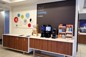 A coffee station with a sign that reads "MUST. HAVE. COFFEE. EXPRESS." - Holiday Inn Express & Suites Ashland by IHG (Ashland)
