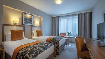 Hypo-allergenic bedding, in-room safe, desk, laptop workspace