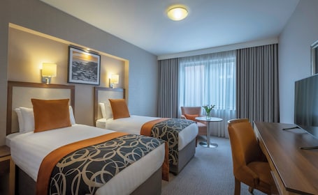 Hypo-allergenic bedding, in-room safe, desk, laptop workspace. Clayton Hotel Belfast City