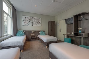Quadruple Room | 1 bedroom, in-room safe, individually decorated, individually furnished