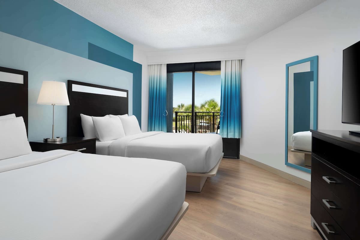 Premium bedding, down duvets, pillow-top beds, in-room safe