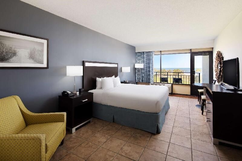 Premium bedding, down comforters, pillowtop beds, in-room safe
