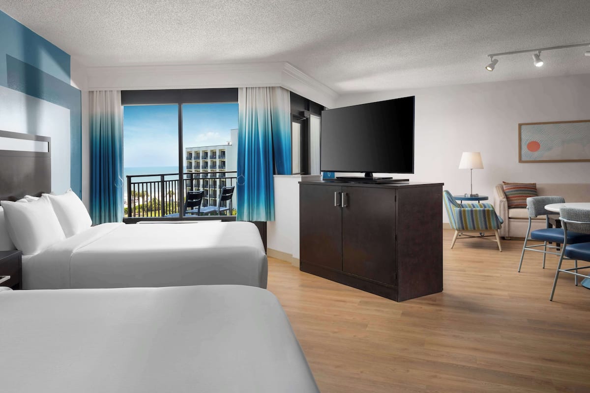 Premium bedding, down duvets, pillow-top beds, in-room safe