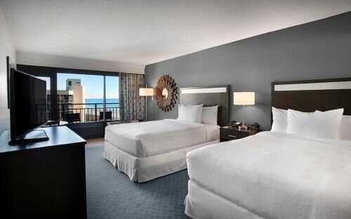 Premium bedding, down comforters, pillowtop beds, in-room safe