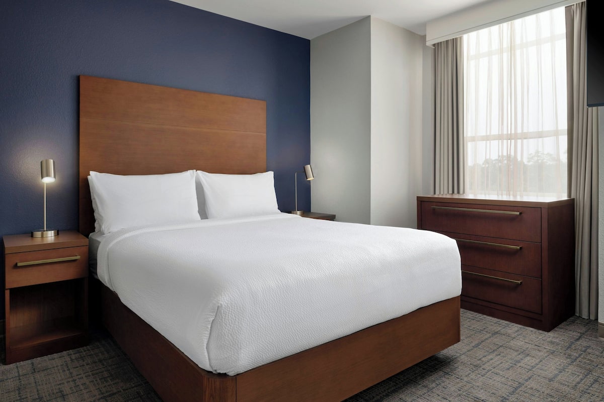 Hypo-allergenic bedding, desk, laptop workspace, iron/ironing board