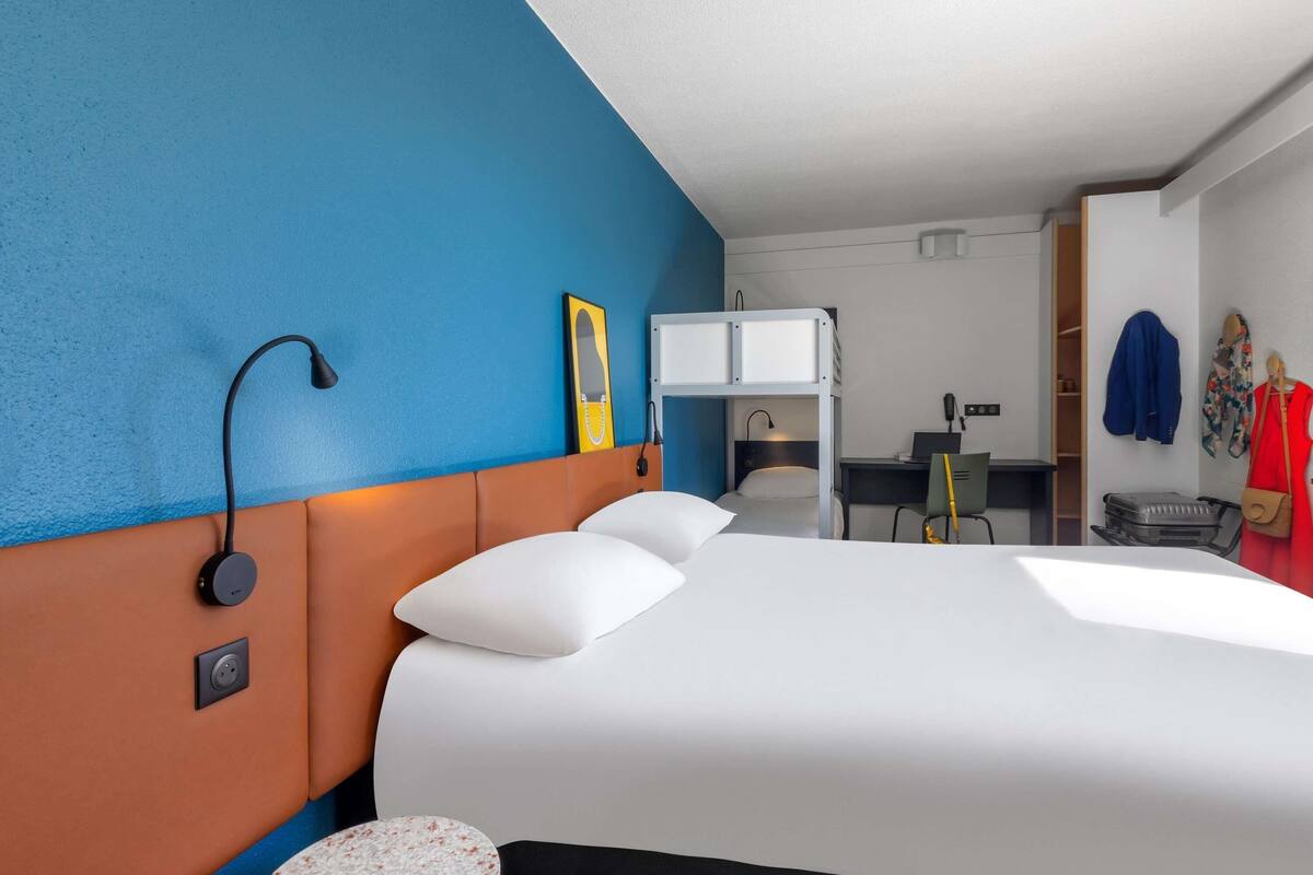 premium bedding, desk, laptop workspace, blackout curtains