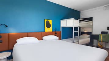Premium bedding, desk, laptop workspace, blackout curtains