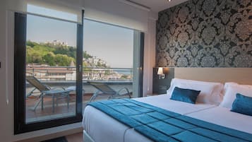 Superior Twin kamer | Een minibar, een kluis op de kamer, een bureau, geluiddichte muren