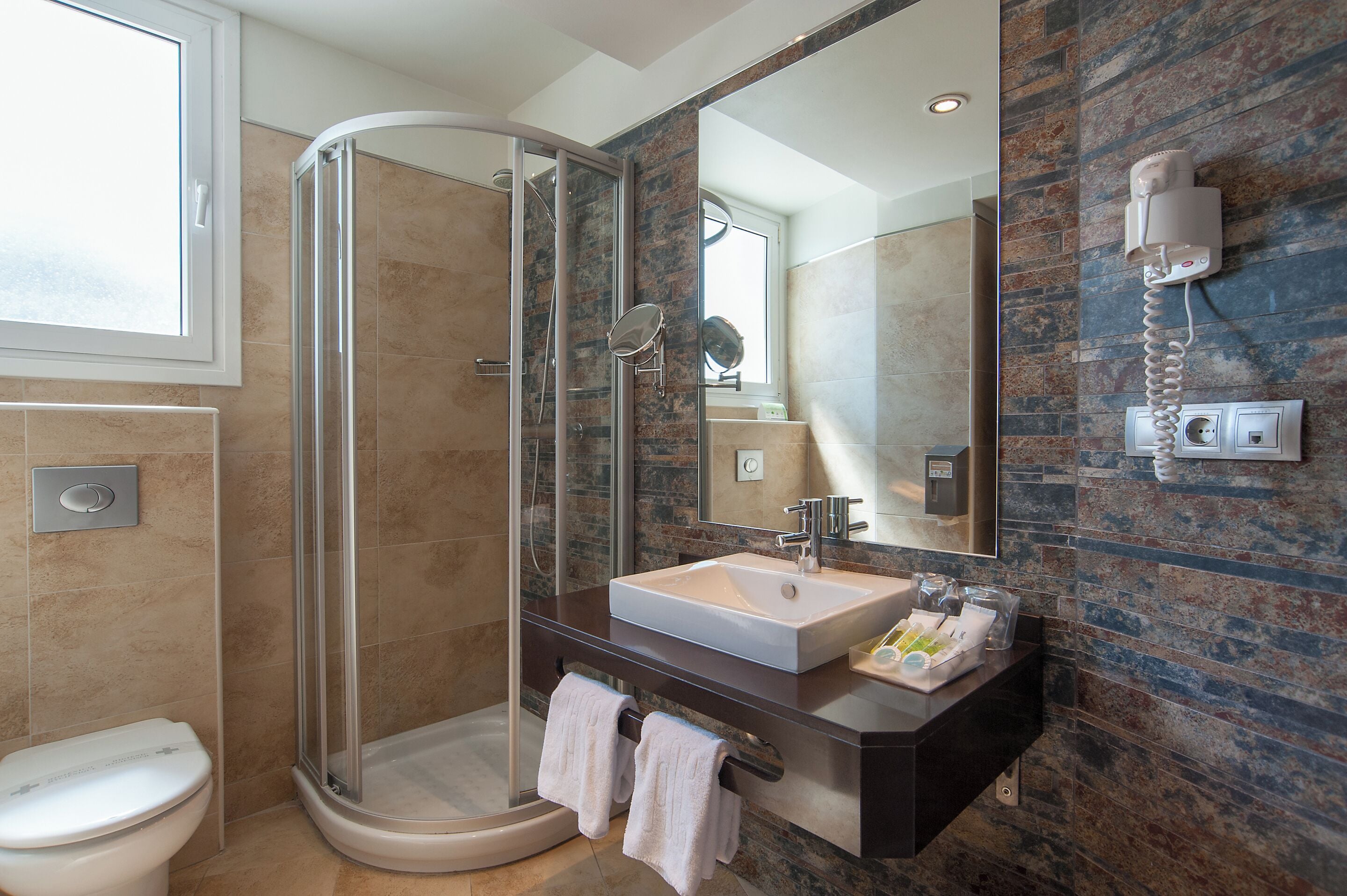 superior twin room | bathroom | free toiletries, hair dryer, bidet, towels