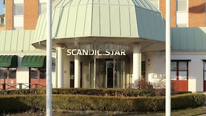 A building with a sign reading "SCANDIC STAR" and a covered entrance. - Scandic Star (Lund)