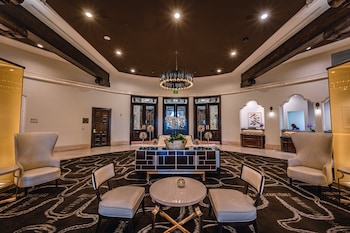 A spacious casino with multiple gaming tables and a large, ornate ceiling. at Green Valley Ranch Resort and Spa