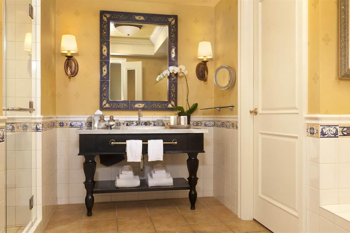 Separate tub and shower, deep soaking tub, designer toiletries
