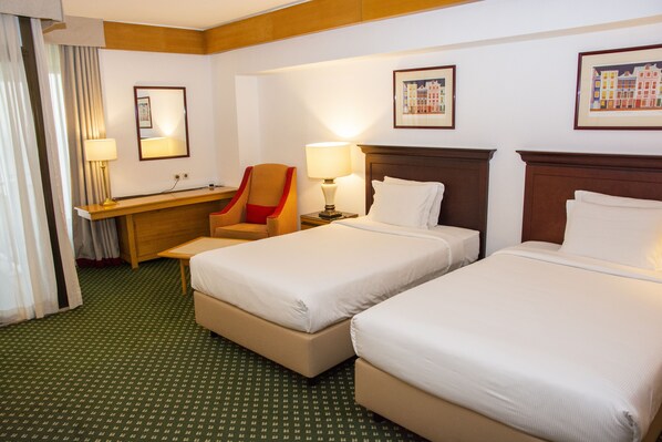 Hypo-allergenic bedding, down duvets, in-room safe, soundproofing