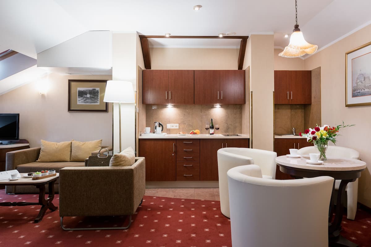 deluxe suite | private kitchenette | mini-fridge, electric kettle, cleaning supplies, kitchen islands