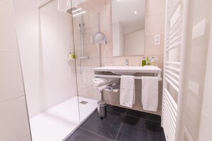 Free toiletries, hair dryer, bathrobes, slippers