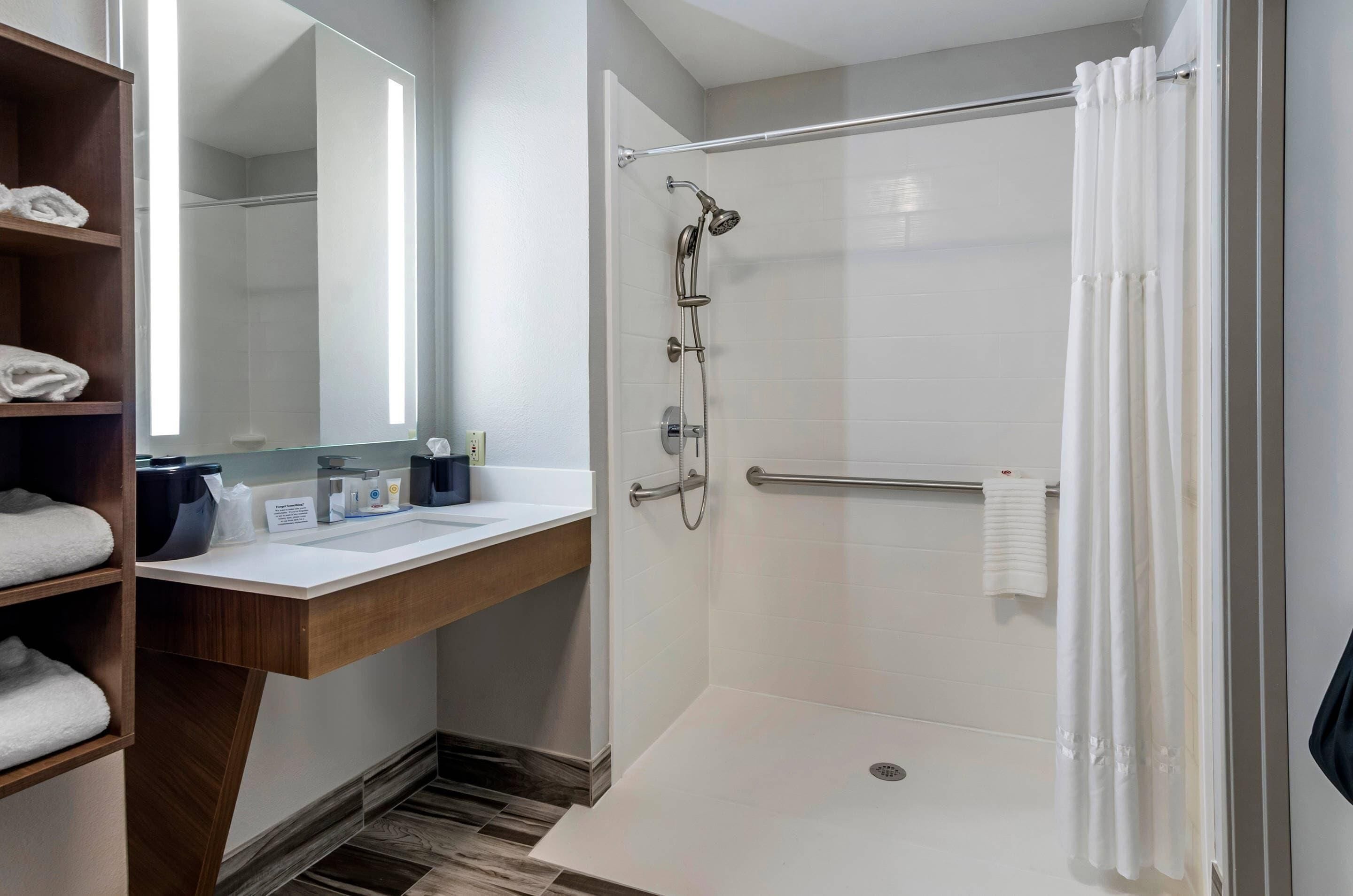 desk, laptop workspace, blackout curtains, iron/ironing board