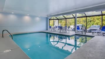 Indoor pool, open 10:00 AM to 9:00 PM, pool loungers