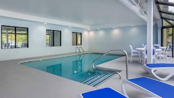 Indoor pool, open 10:00 AM to 9:00 PM, pool loungers