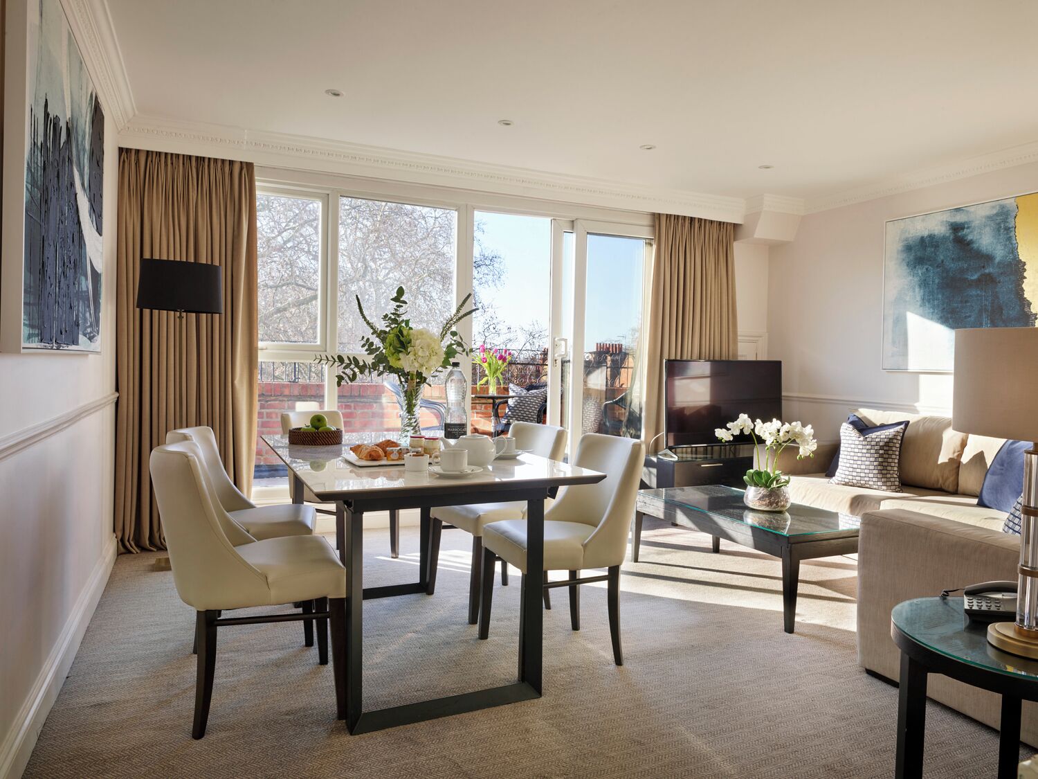 Three Bedroom, two Bathroom Apartment | Living area | 42-inch flat-screen TV with cable channels, LCD TV