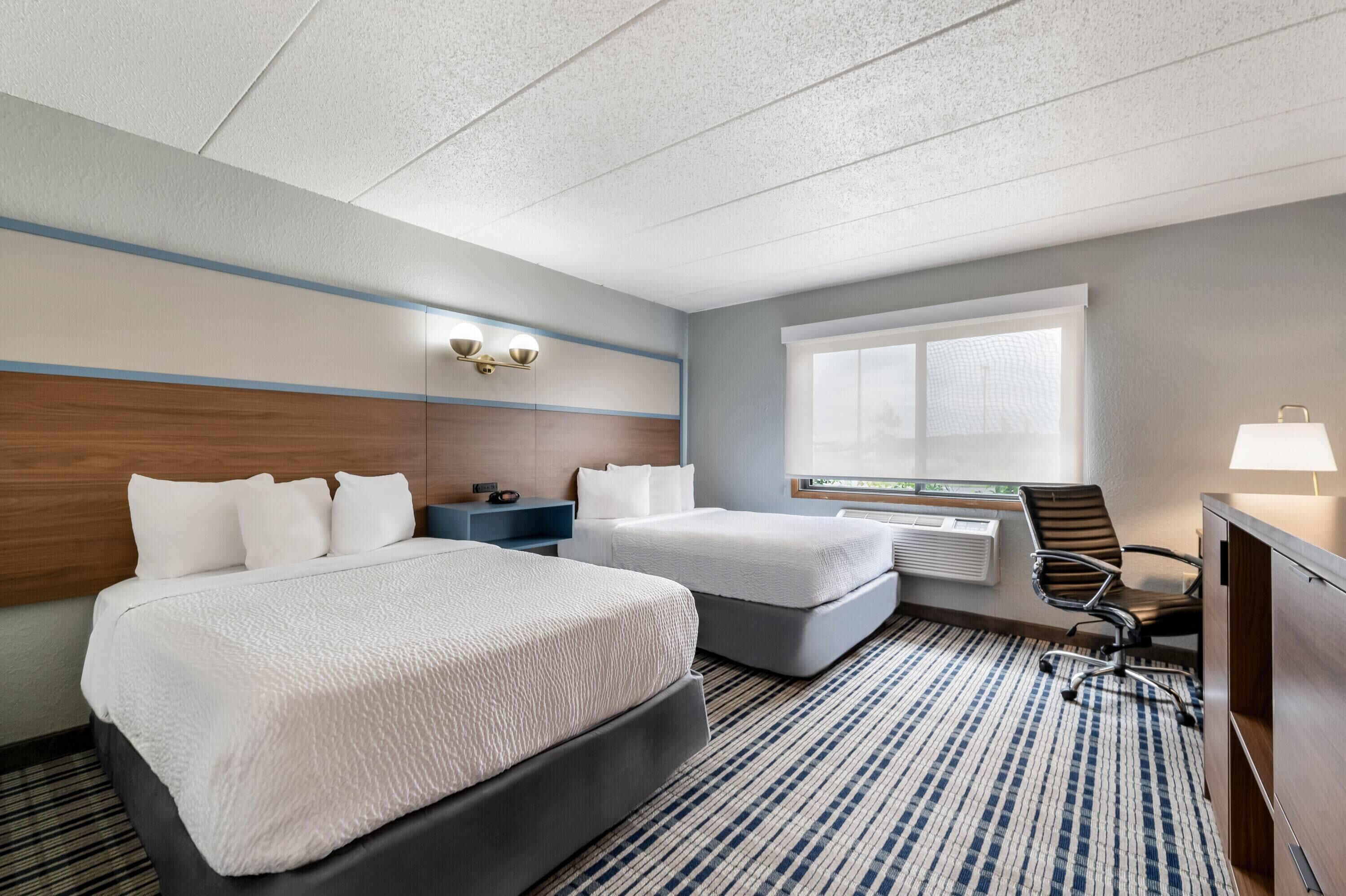 Room, 2 Double Beds, Accessible, Non Smoking | Desk, blackout curtains, iron/ironing board, cots/infant beds