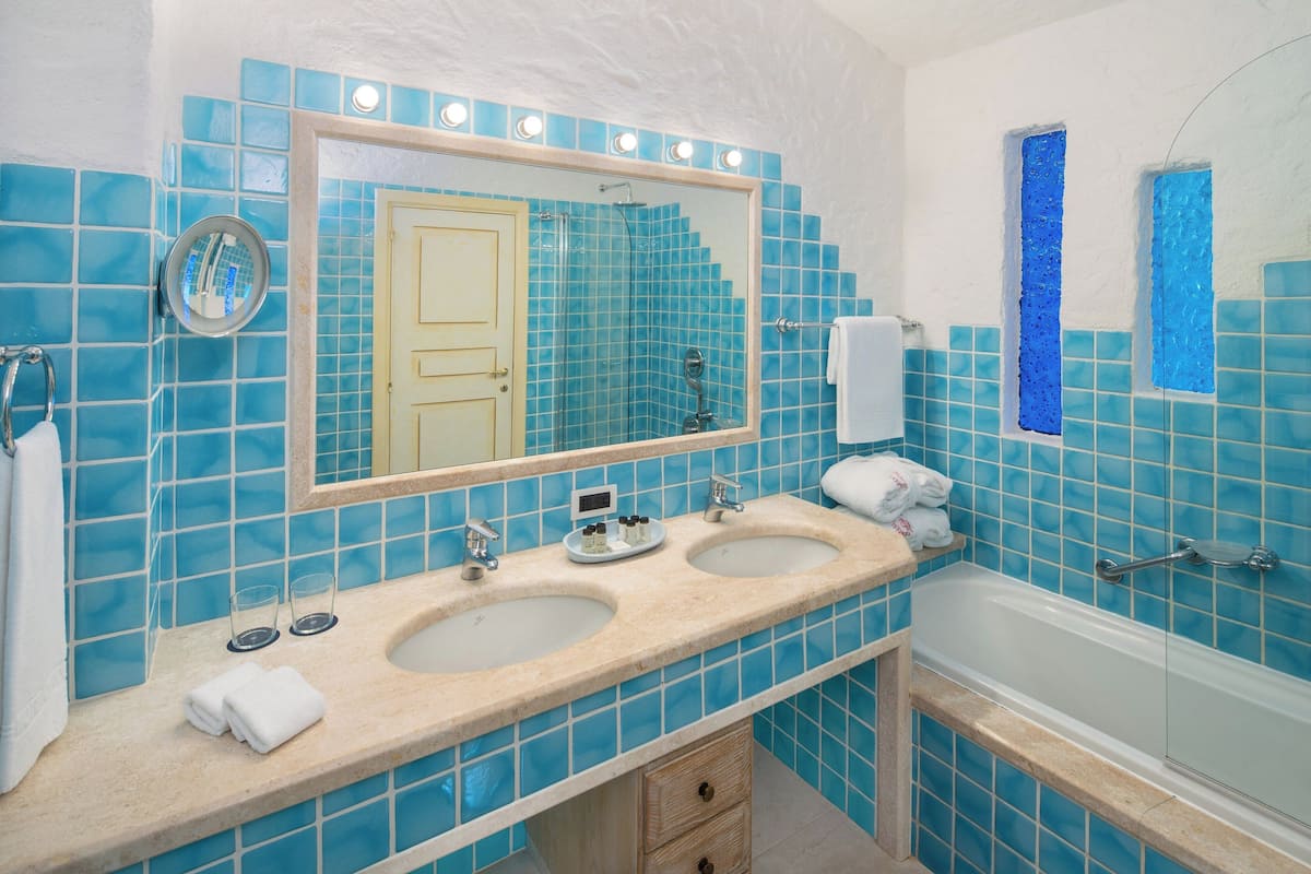 hair dryer, bathrobes, slippers, bidet