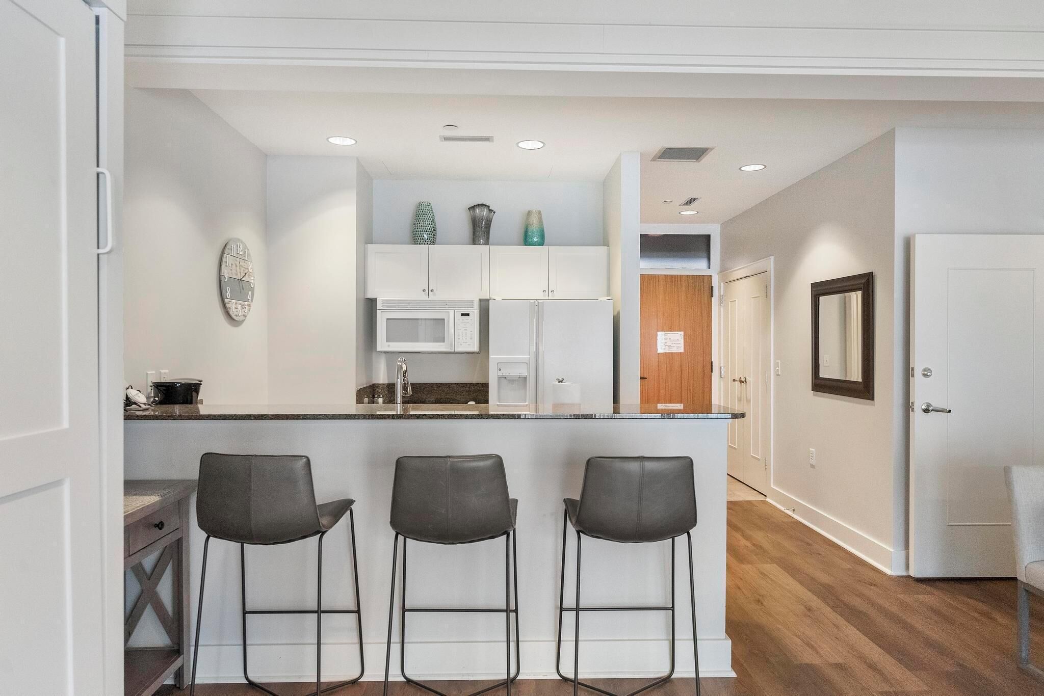 full-sized fridge, microwave, stovetop, dishwasher