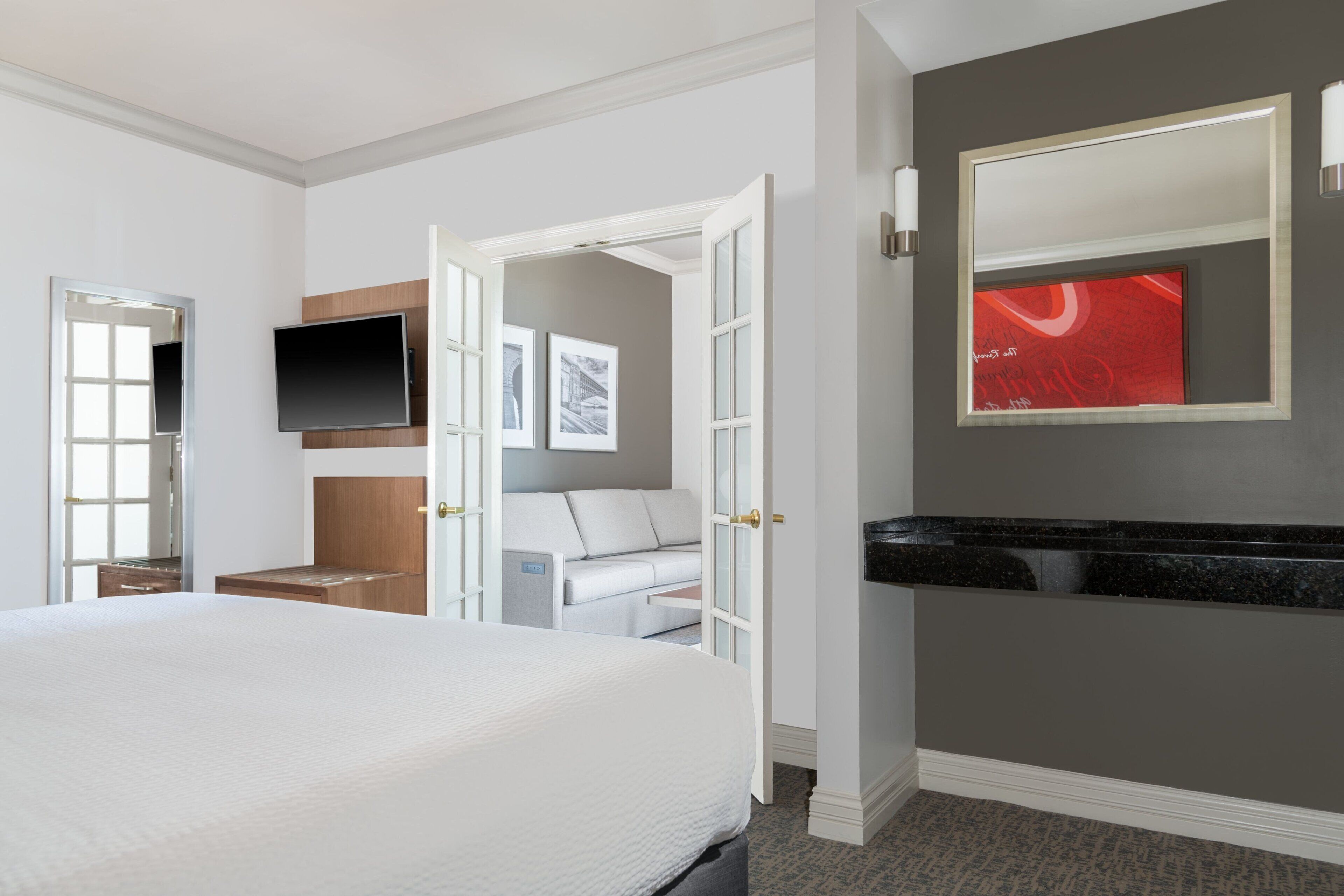 suite, 1 bedroom, city view | premium bedding, in-room safe, blackout curtains, iron/ironing board