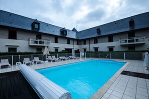 Outdoor pool, pool umbrellas, pool loungers