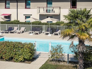 Outdoor pool, pool umbrellas, pool loungers