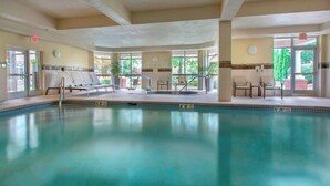 A large indoor pool with lounge chairs and a hot tub. - Courtyard by Marriott Basking Ridge (Basking Ridge)