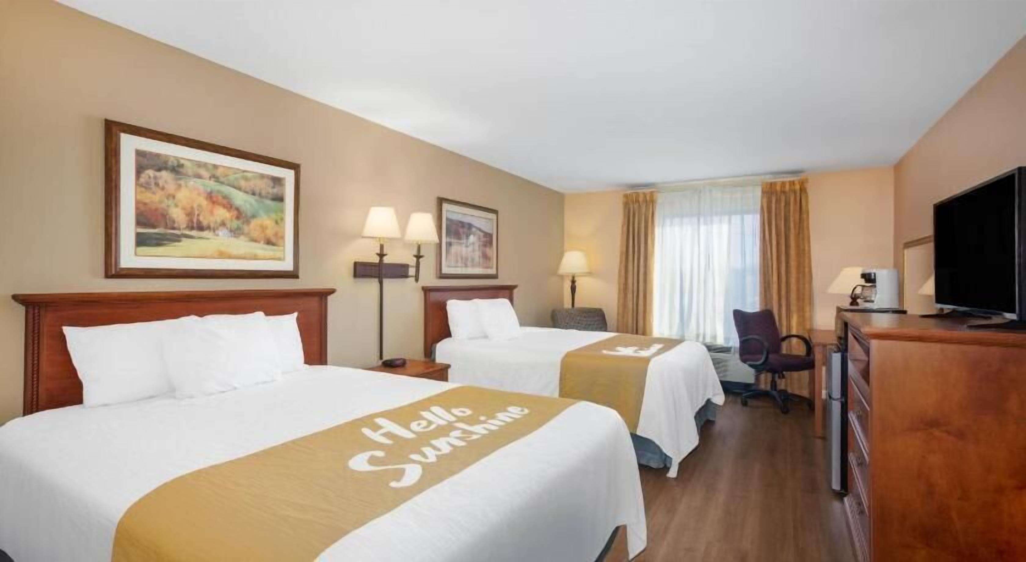 Premium bedding, desk, iron/ironing board, free cribs/infant beds