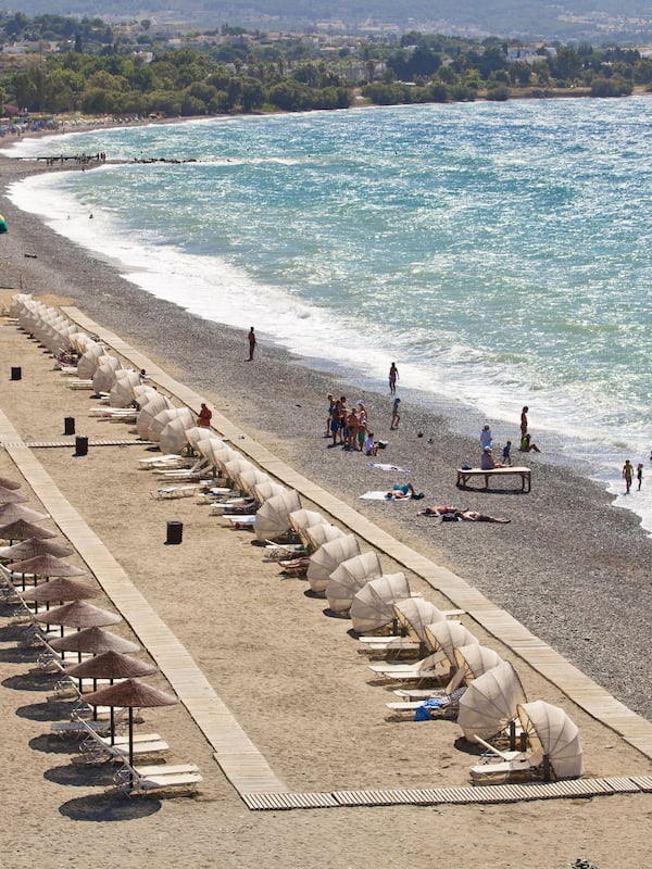 On the beach, beach cabanas, sun-loungers, beach umbrellas