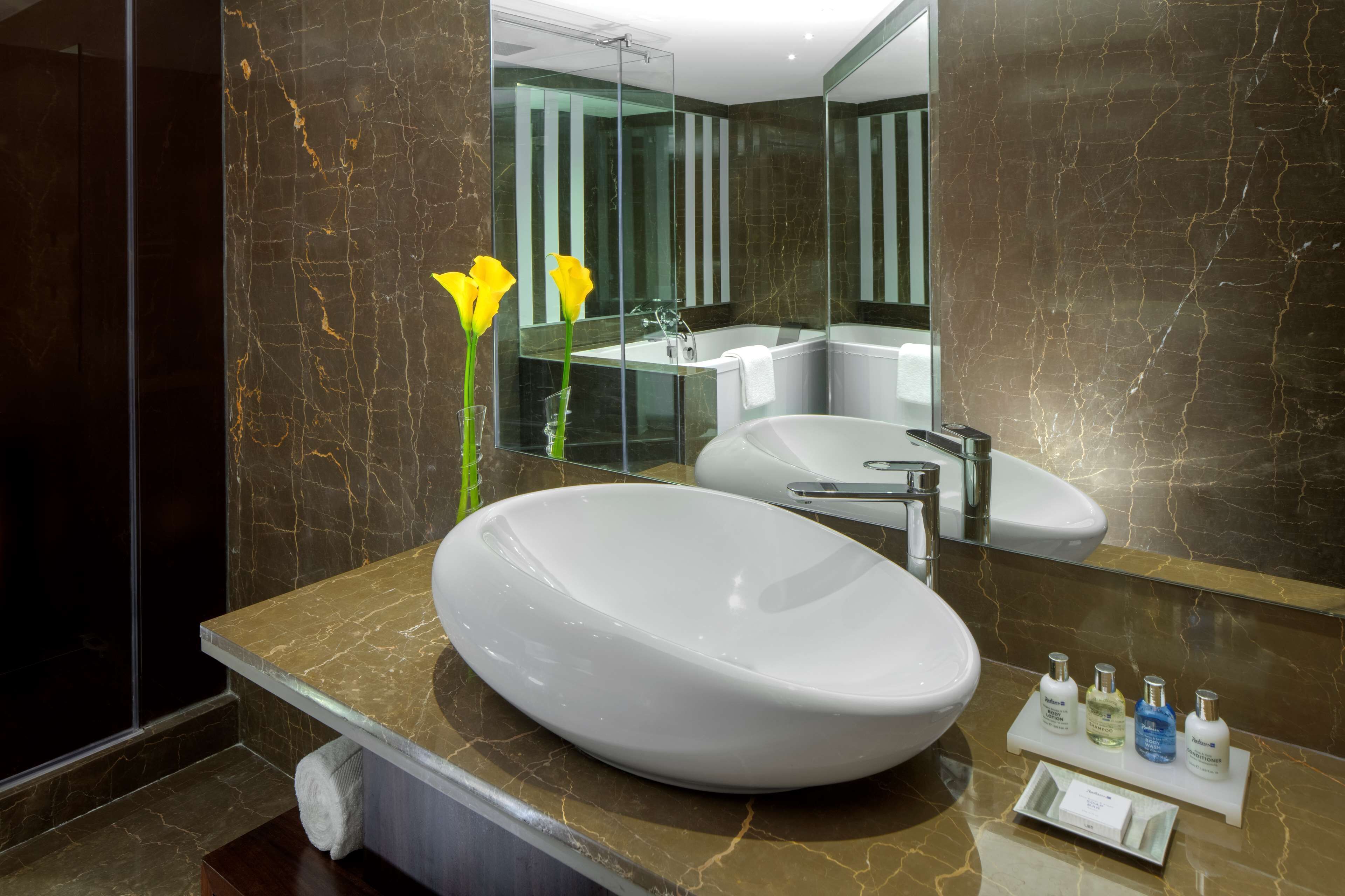 rainfall showerhead, free toiletries, hair dryer, bathrobes