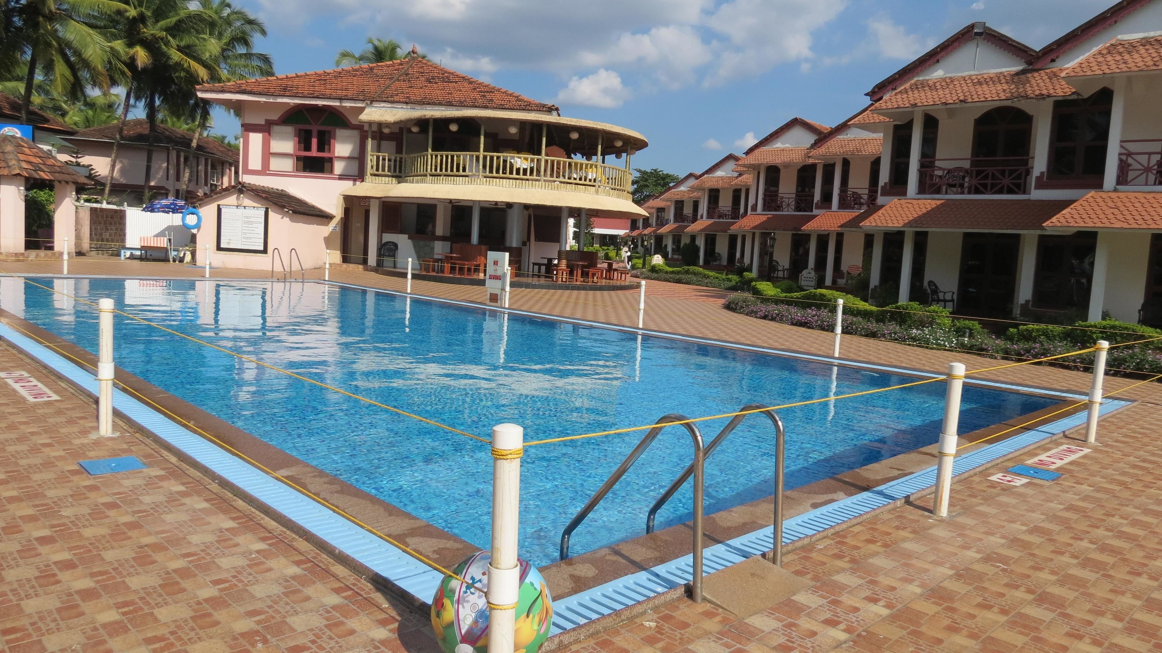 Outdoor pool, pool umbrellas, pool loungers