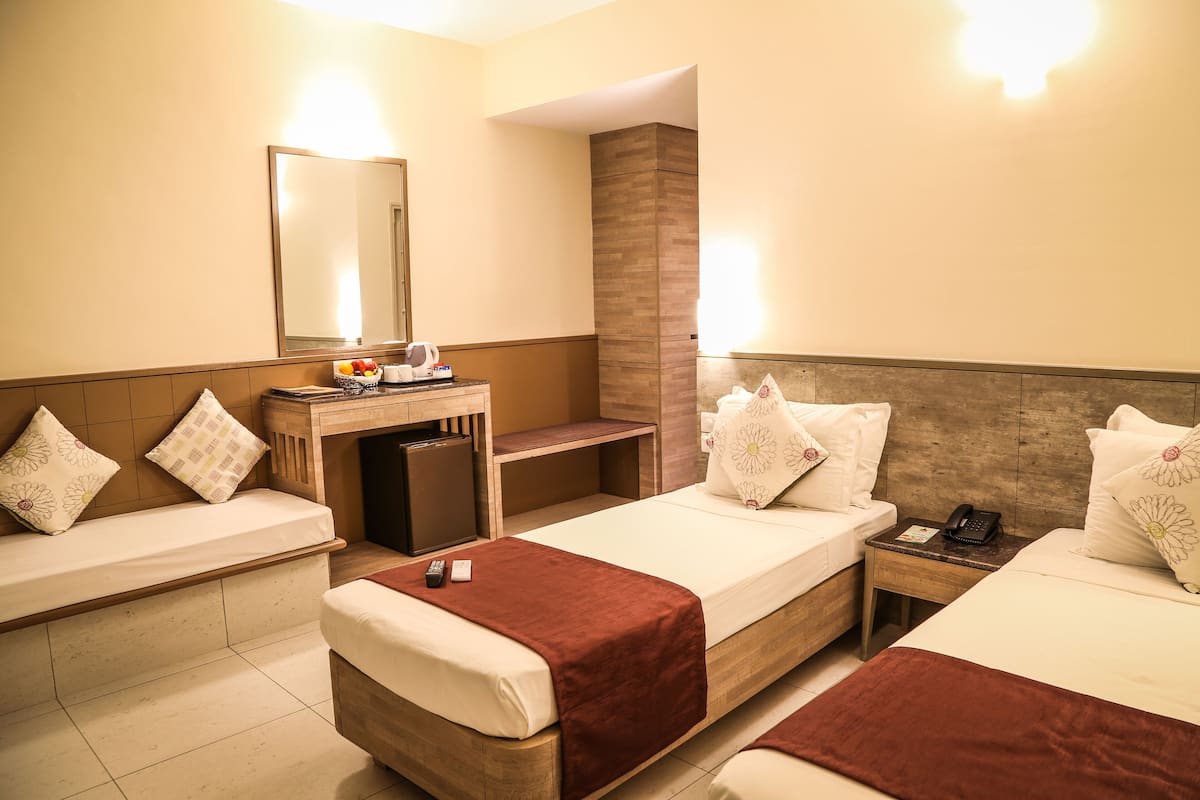 Deluxe Room | 2 bedrooms, premium bedding, in-room safe, desk