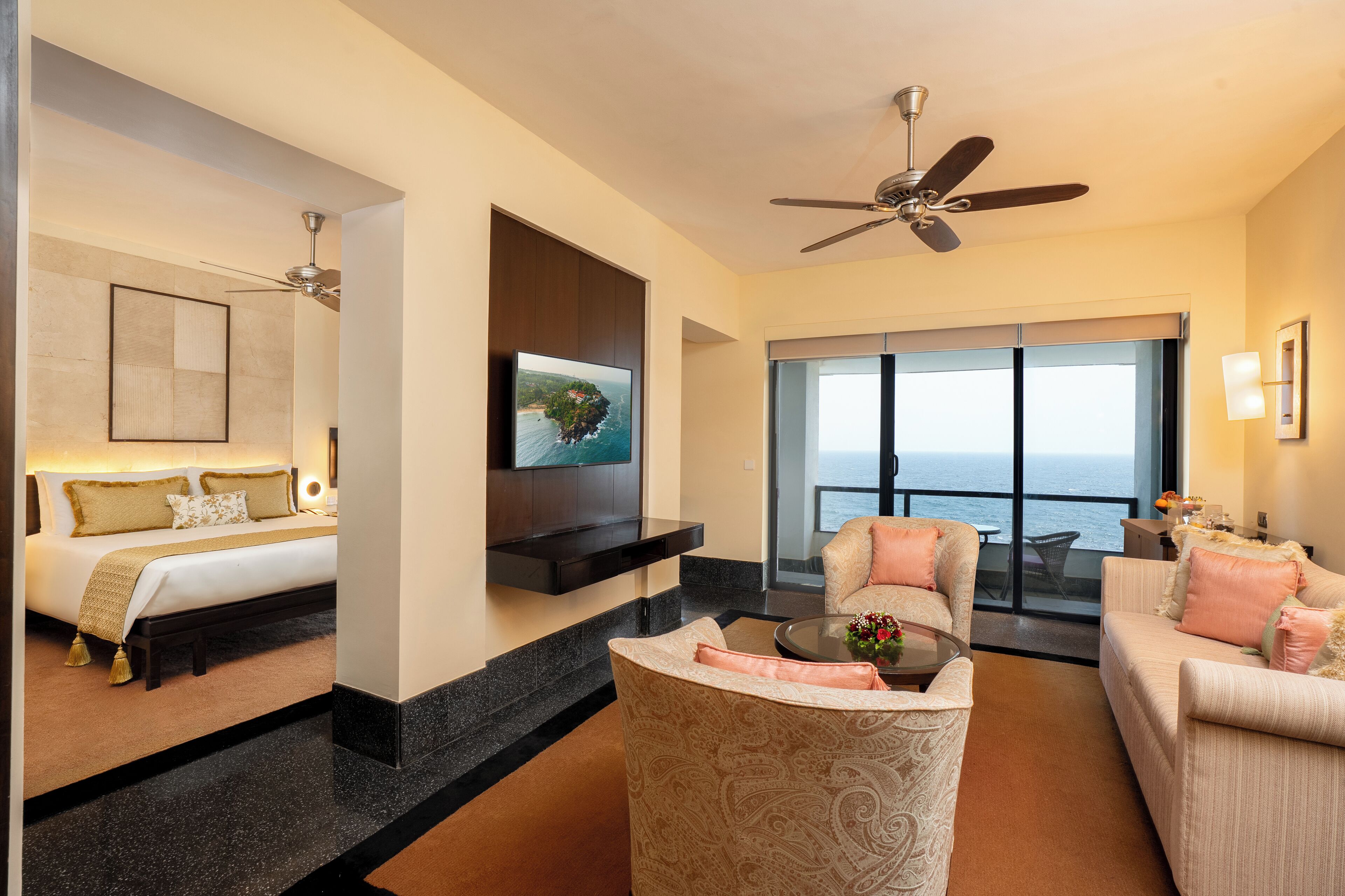 club suite (royal club) | living room | 43-inch tv with cable channels, books