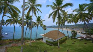 Suite, uitzicht op oceaan | Uitzicht op strand/zee