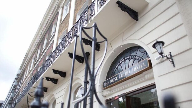 A hotel facade with a sign reading "The Rose Court Hotel." - Rose Court Hotel (London)