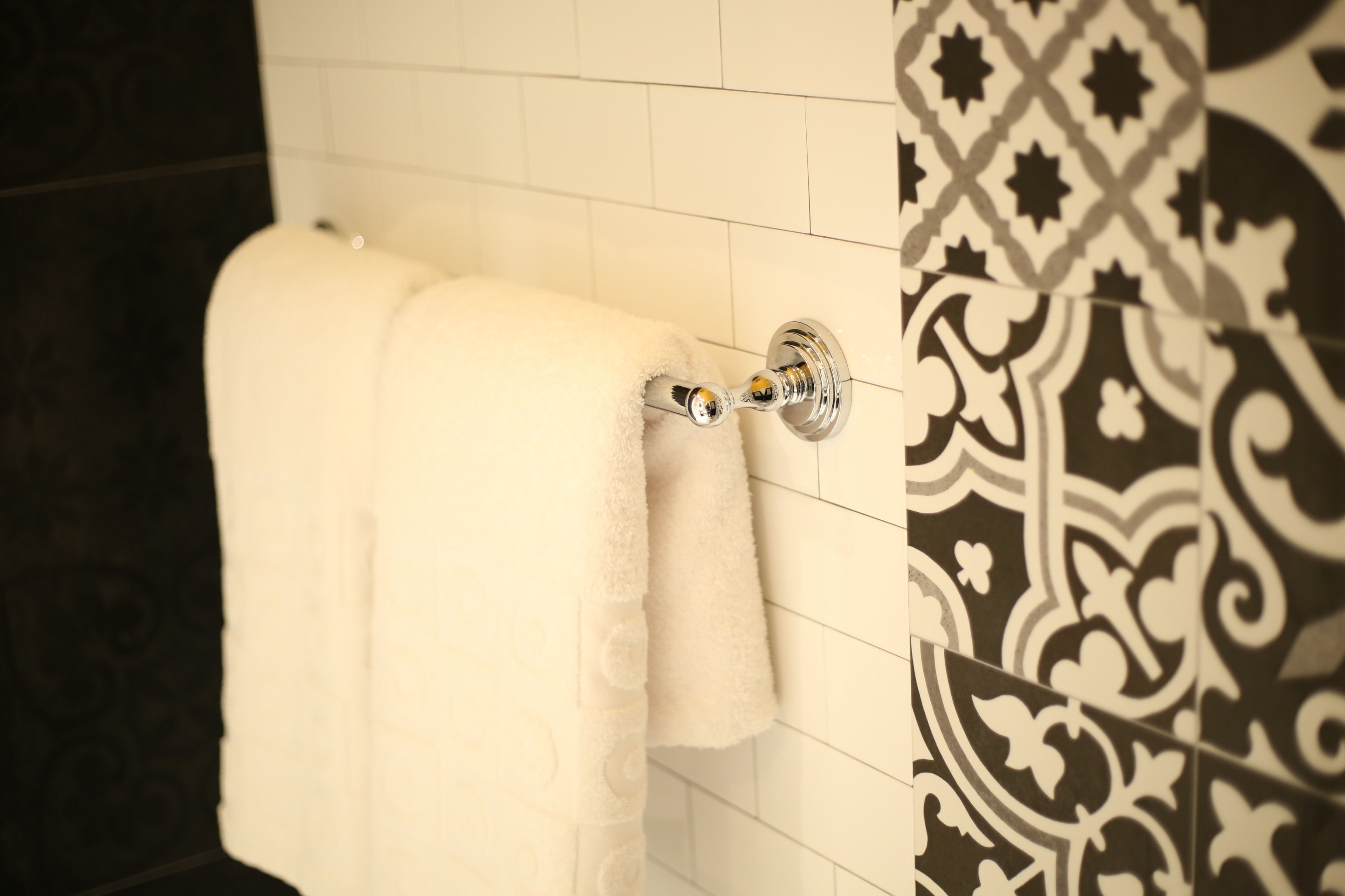 designer toiletries, hair dryer, towels, soap