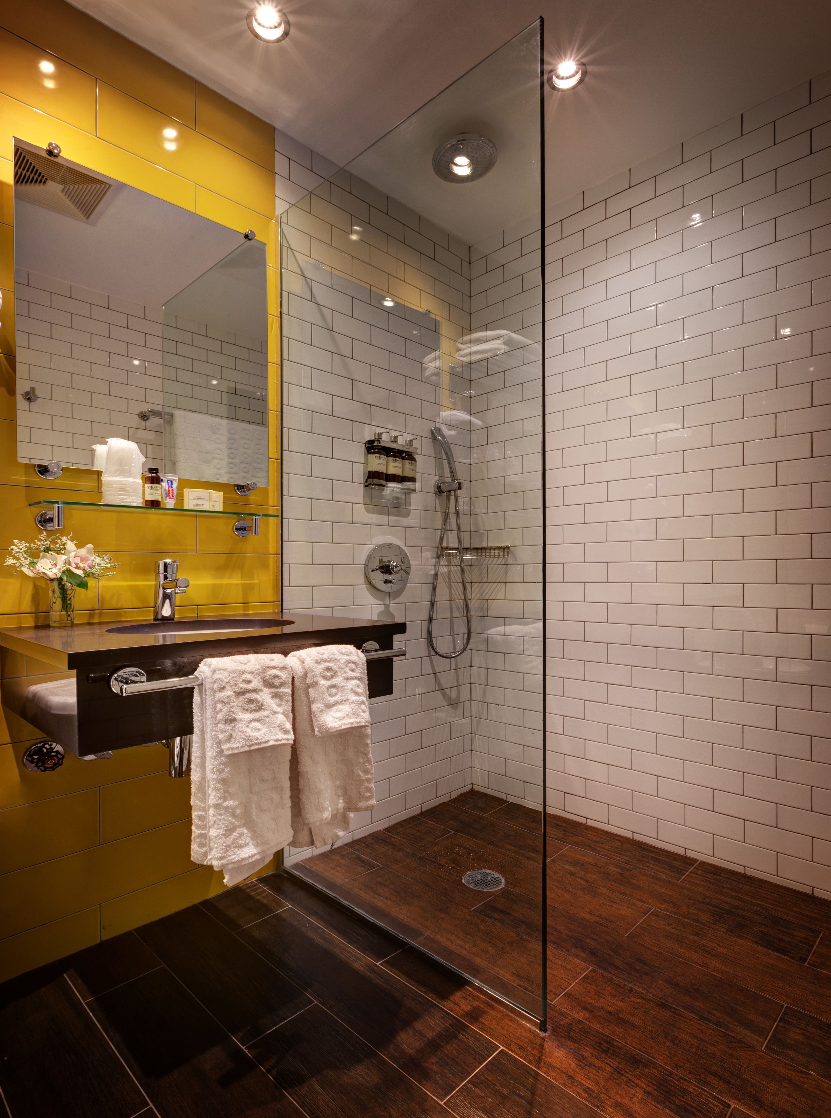 designer toiletries, hair dryer, towels, soap